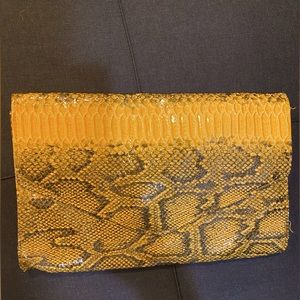Faux snake skin clutch